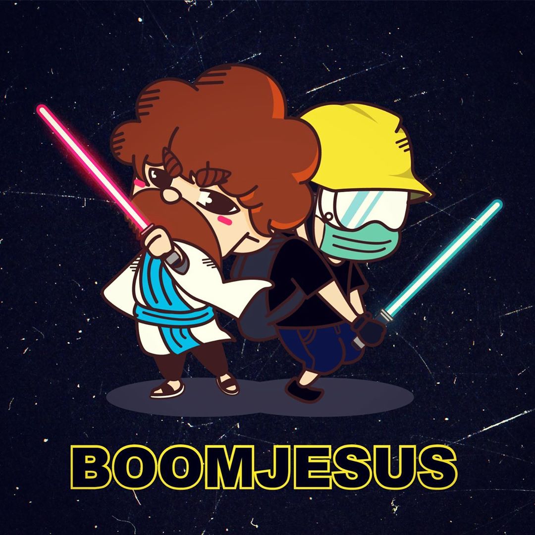 A cartoonish chibi-style illustration of a Jedi - caucasian man in a robe holding a red lightsaber with a bushy beard - standing back to back with a Hong Kong protestor wielding a green lightsaber, all on a dark blue background. There is a caption in English reading "BOOMJESUS".